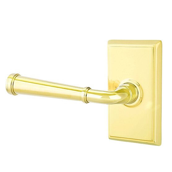 The Emtek Merrimack Lever With Rectangular Rosette in Lifetime Polished Brass finish