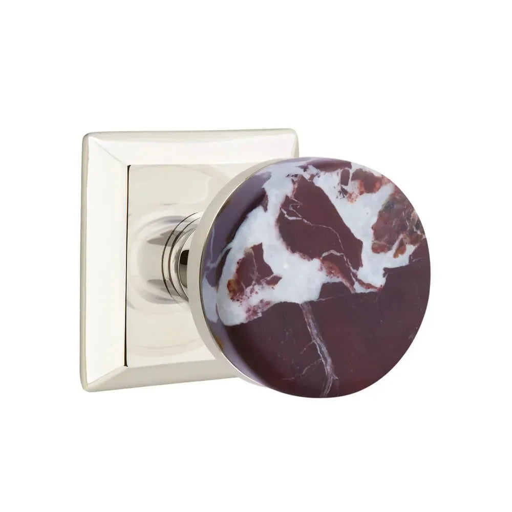 The Emtek Select Conical Rosso Levanto Marble Knobset with Quincy Rosette in Lifetime Polished Nickel finish.