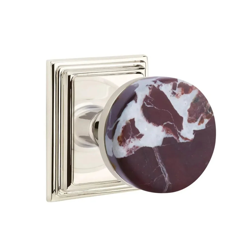 The Emtek Select Conical Rosso Levanto Marble Knobset with Wilshire Rosette in Lifetime Polished Nickel finish.