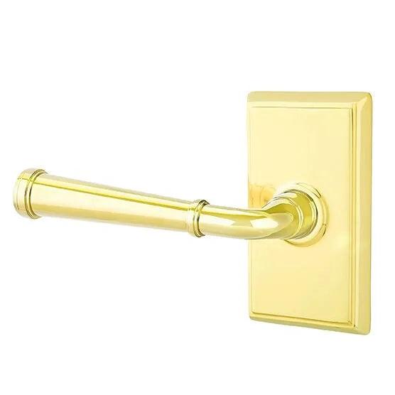 The Emtek Merrimack Lever With Rectangular Rosette in Unlacquered Brass finish