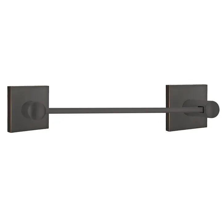 The Emtek Modern Brass Towel Bar with Square Rosette in Oil Rubbed Bronze finish.