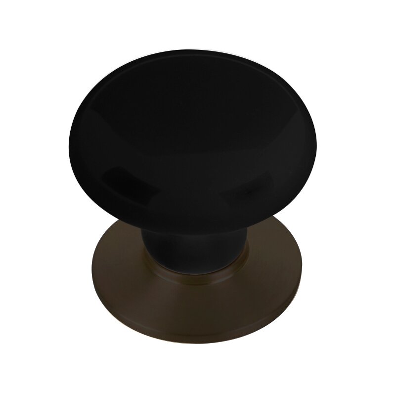 The Emtek Ebony Porcelain Cabinet Knob in Oil Rubbed Bronze finish