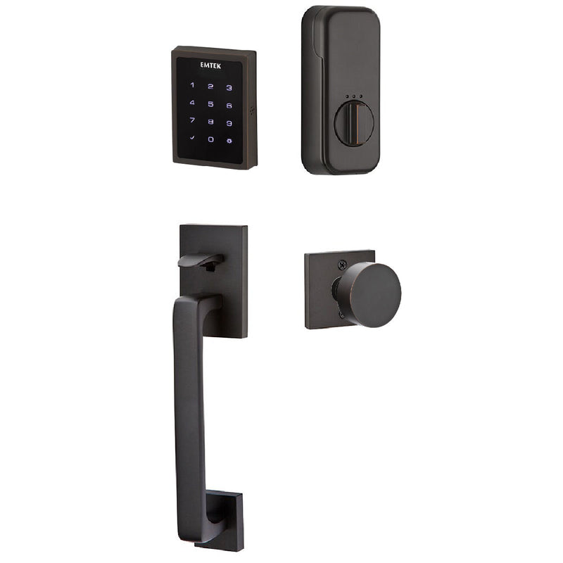 The Emtek Electronic EMPowered Motorized Touchscreen Keypad Entry Set With Baden Grip and Round Knob in Oil Rubbed Bronze finish