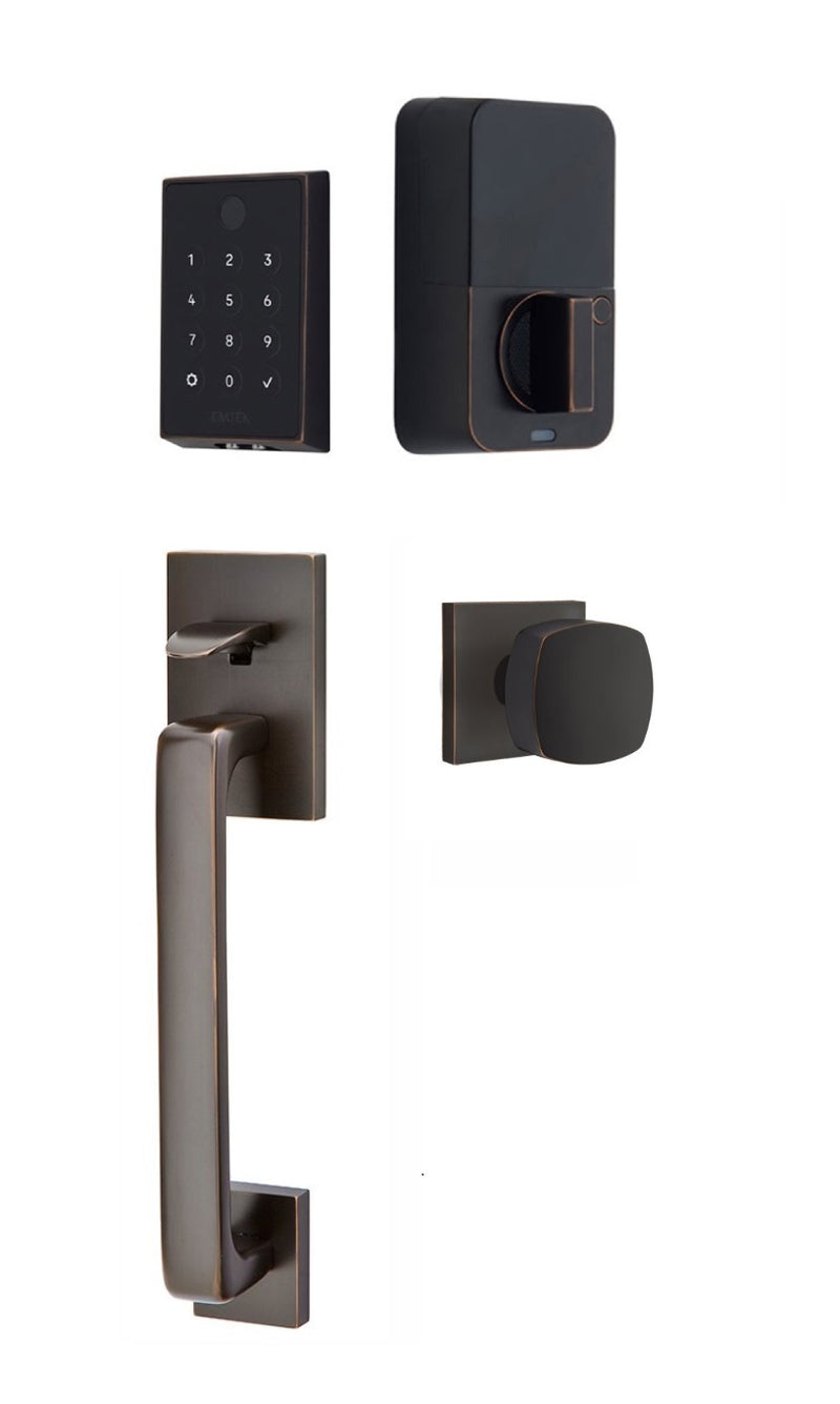 The Emtek EMPowered 2 Touch Entry Set with Baden Grip and Interior Freestone Knob in Oil Rubbed Bronze finish.