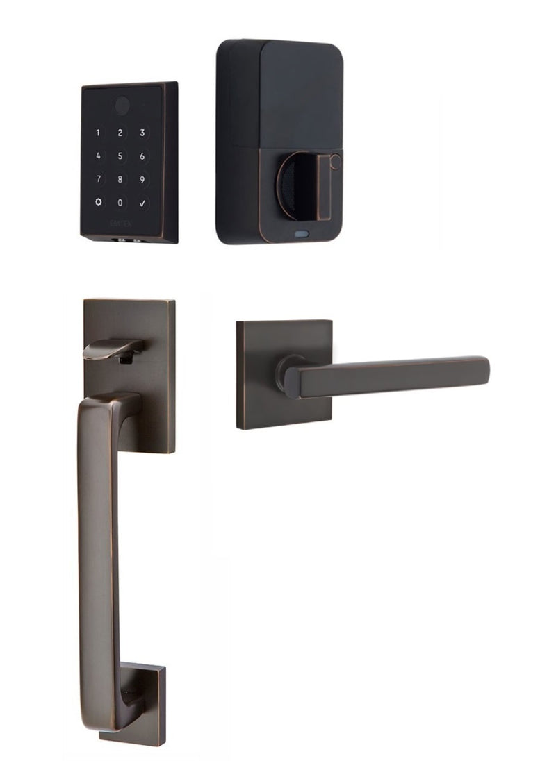 The Emtek EMPowered 2 Touch Entry Set with Baden Grip and Interior Freestone Lever in Oil Rubbed Bronze finish.