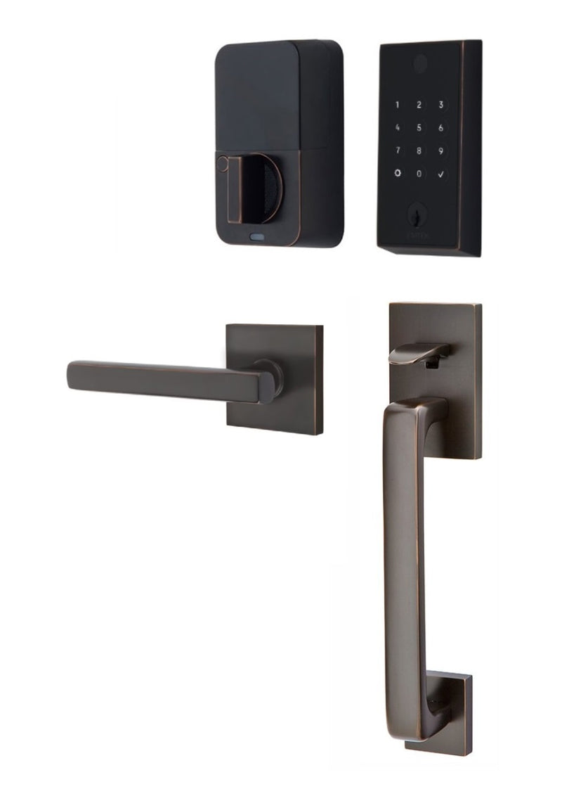 The Emtek EMPowered 2 Touch Entry Set with Baden Grip and Interior Freestone Lever in Oil Rubbed Bronze finish.