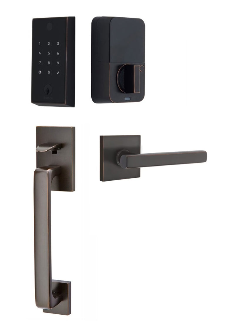 The Emtek EMPowered 2 Touch Entry Set with Baden Grip and Interior Freestone Lever in Oil Rubbed Bronze finish.