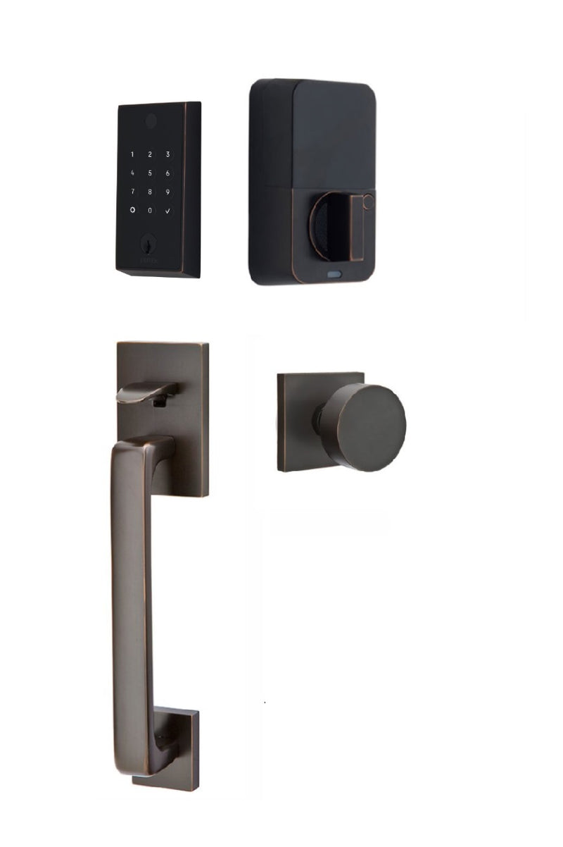 The Emtek EMPowered 2 Touch Entry Set with Baden Grip and Interior Round Knob in Oil Rubbed Bronze finish.