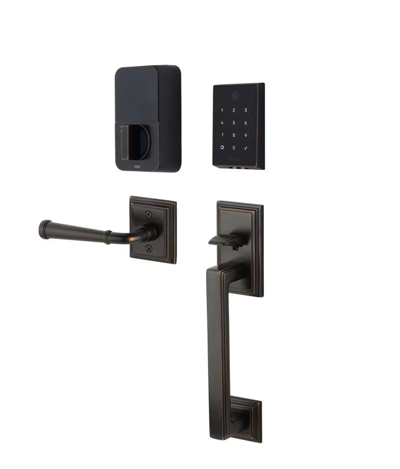 The Emtek EMPowered 2 Touch Entry Set with Hamden Grip and Interior Merrimack Lever in Oil Rubbed Bronze finish.