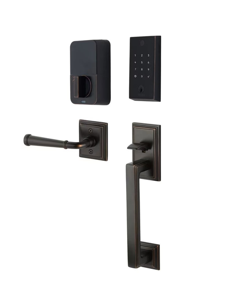 The Emtek EMPowered 2 Touch Entry Set with Hamden Grip and Interior Merrimack Lever in Oil Rubbed Bronze finish.