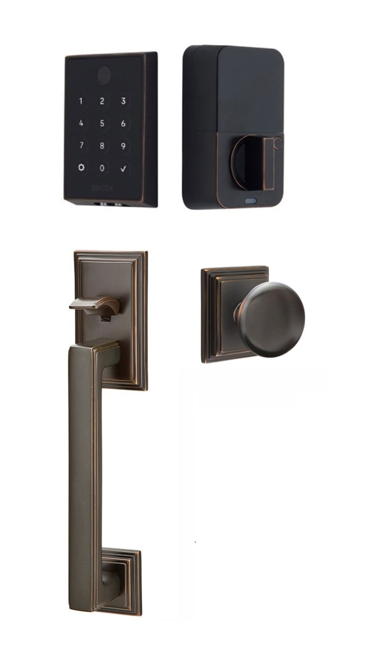 The Emtek EMPowered 2 Touch Entry Set with Hamden Grip and Interior Providence Knob in Oil Rubbed Bronze finish.