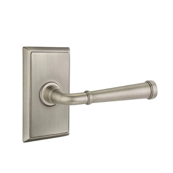 The Emtek Merrimack Lever With Rectangular Rosette in Pewter finish