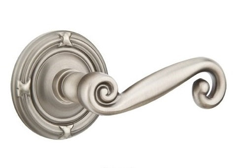 The Emtek Rustic Lever With Ribbon & Reed Rosette in Pewter finish.