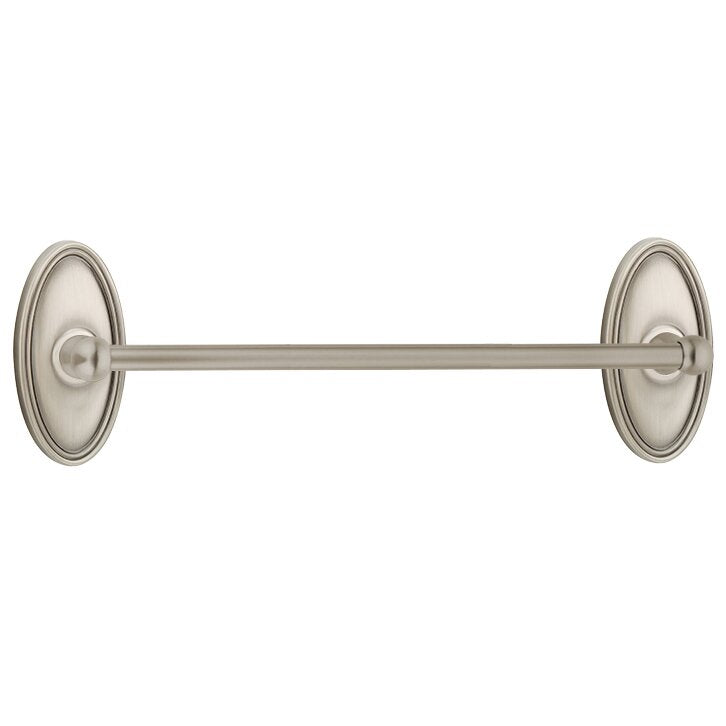 The Emtek Traditional Brass Towel Bar with Oval Rosette in Pewter finish.