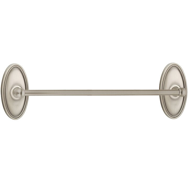 The Emtek Traditional Brass Towel Bar with Oval Rosette in Pewter finish.