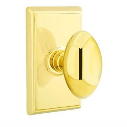 Emtek Egg Knob with Rectangular Rosette in Lifetime Polished Brass finish