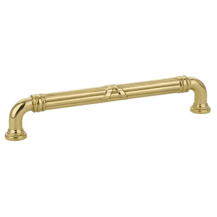 The Emtek Ribbon & Reed Estate Cabinet Pull, 6" Center to Center in Unlacquered Brass finish
