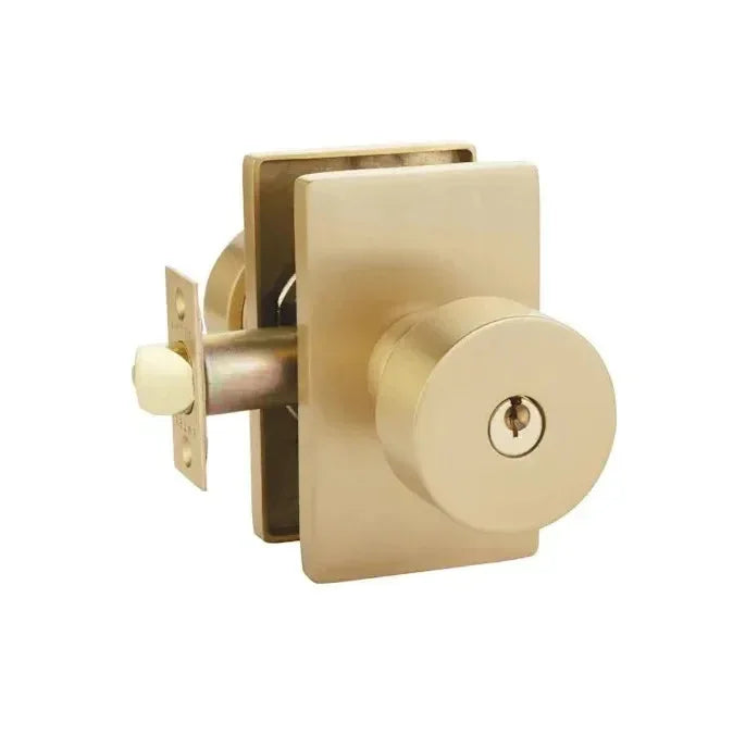 The Emtek Round Knob With Modern Rectangular Rosette in Satin Brass finish.