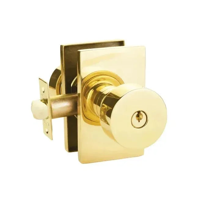 The Emtek Round Knob With Modern Rectangular Rosette in Unlacquered Brass finish.
