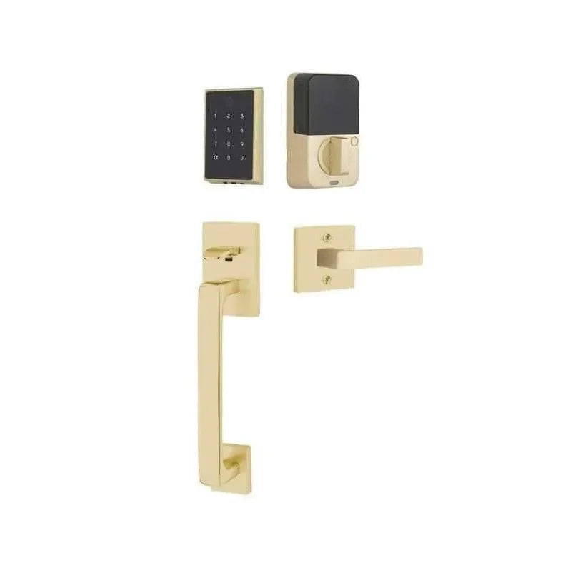 The Emtek EMPowered 2 Touch Entry Set with Baden Grip and Interior Dumont Lever in Satin Brass finish.