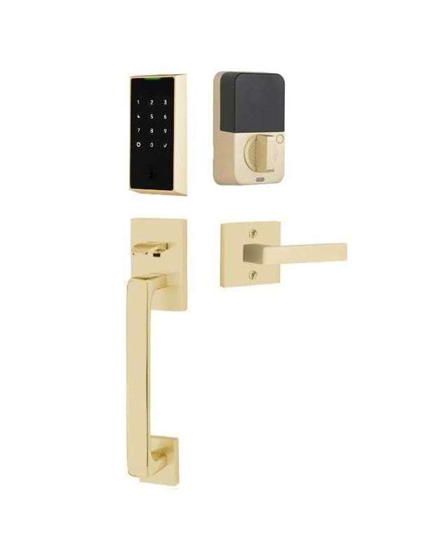 The Emtek EMPowered 2 Touch Entry Set with Baden Grip and Interior Dumont Lever in Satin Brass finish.