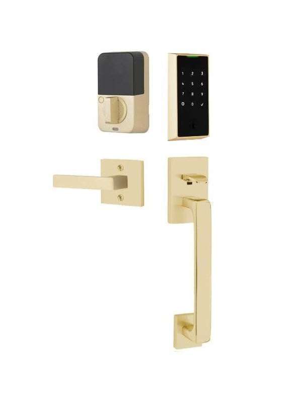 The Emtek EMPowered 2 Touch Entry Set with Baden Grip and Interior Dumont Lever in Satin Brass finish.