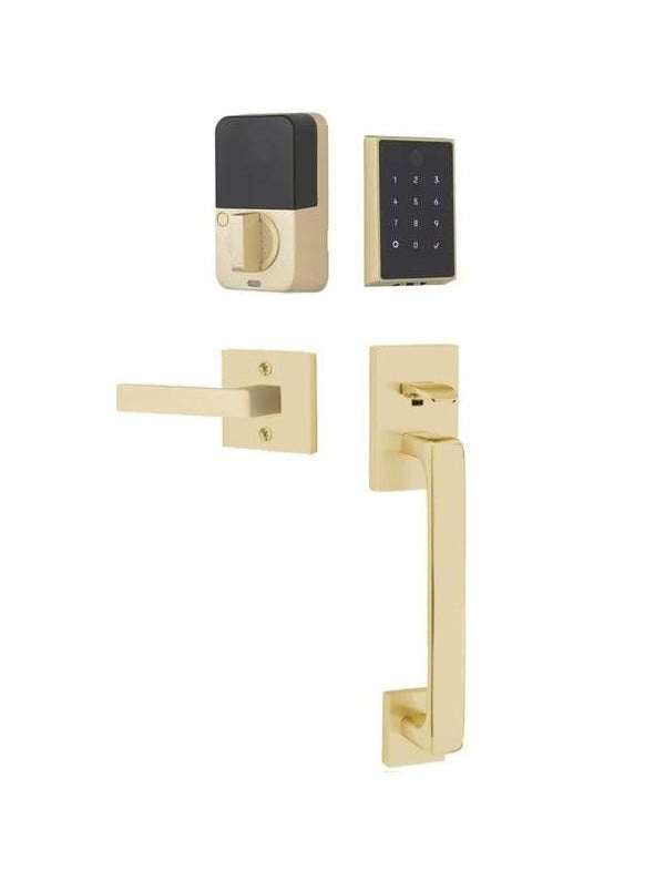 The Emtek EMPowered 2 Touch Entry Set with Baden Grip and Interior Dumont Lever in Satin Brass finish.