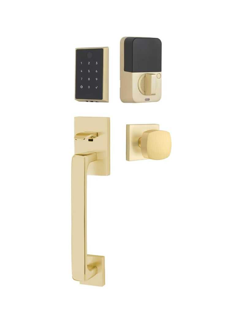 The Emtek EMPowered 2 Touch Entry Set with Baden Grip and Interior Freestone Knob in Satin Brass finish.