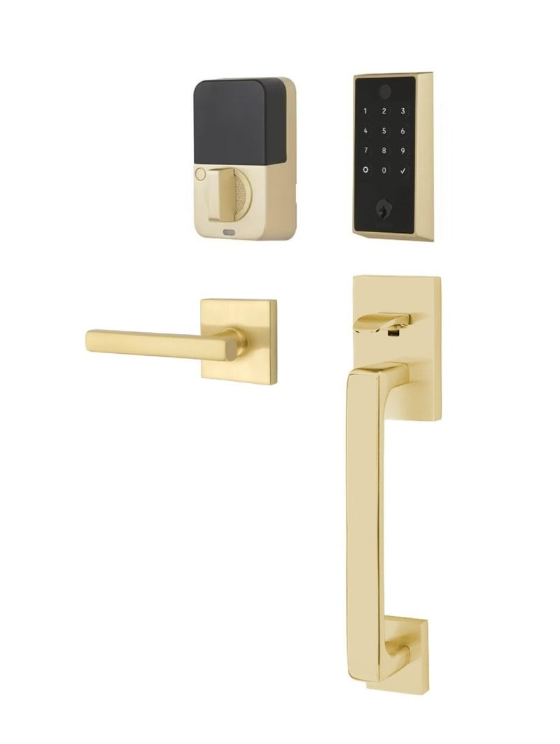 The Emtek EMPowered 2 Touch Entry Set with Baden Grip and Interior Freestone Lever in Satin Brass finish.