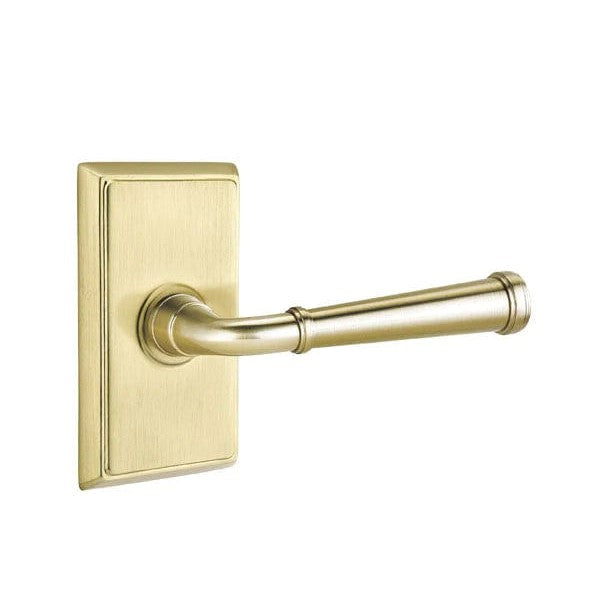 The Emtek Merrimack Lever With Rectangular Rosette in Satin Brass finish