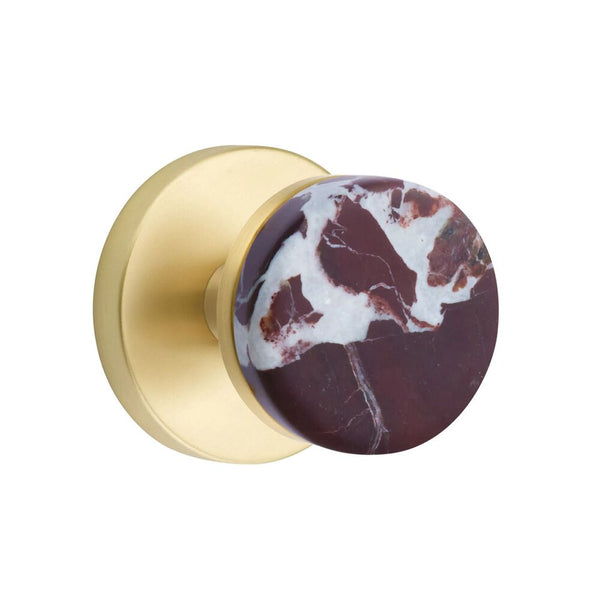 The Emtek Select Conical Rosso Levanto Marble Knobset with Disk Rosette in Satin Brass finish.