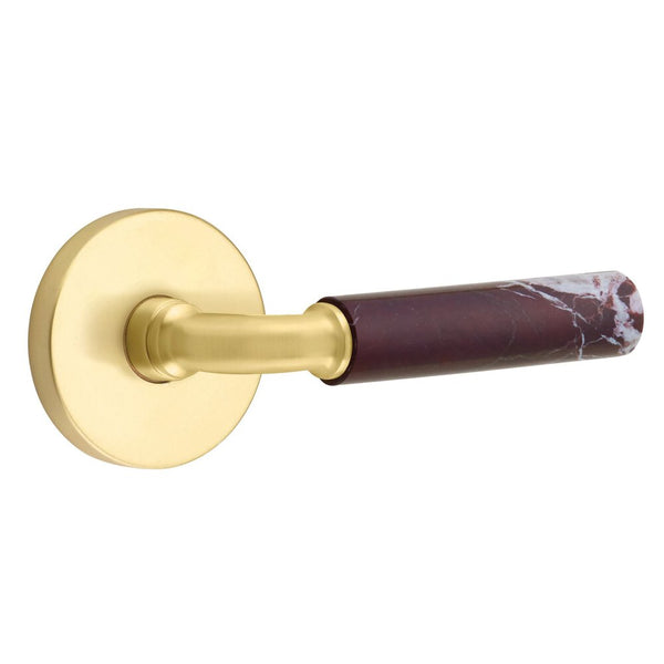 The Emtek Select R-Bar Rosso Levanto Marble Lever with Disk Rosette in Satin Brass finish.
