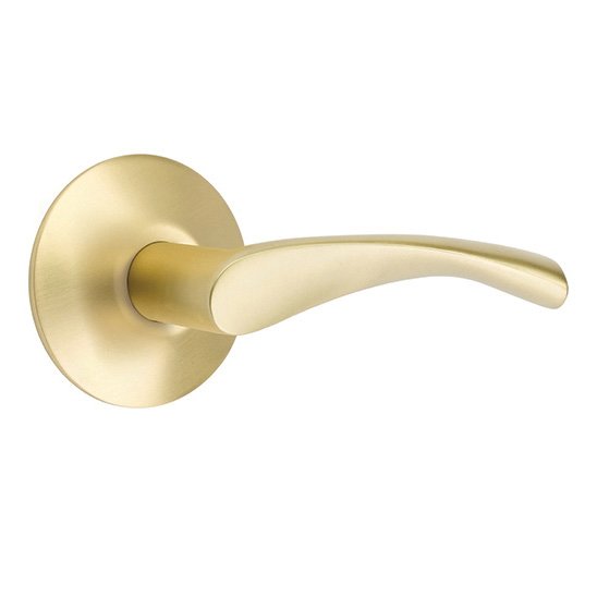 The Emtek Triton Lever With Modern Rosette in Satin Brass finish.