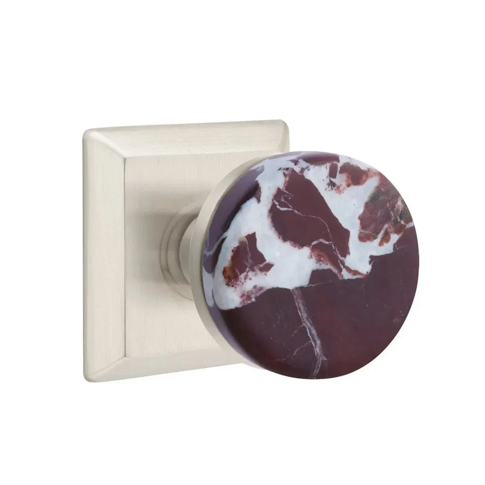 The Emtek Select Conical Rosso Levanto Marble Knobset with Quincy Rosette in Satin Nickel finish.