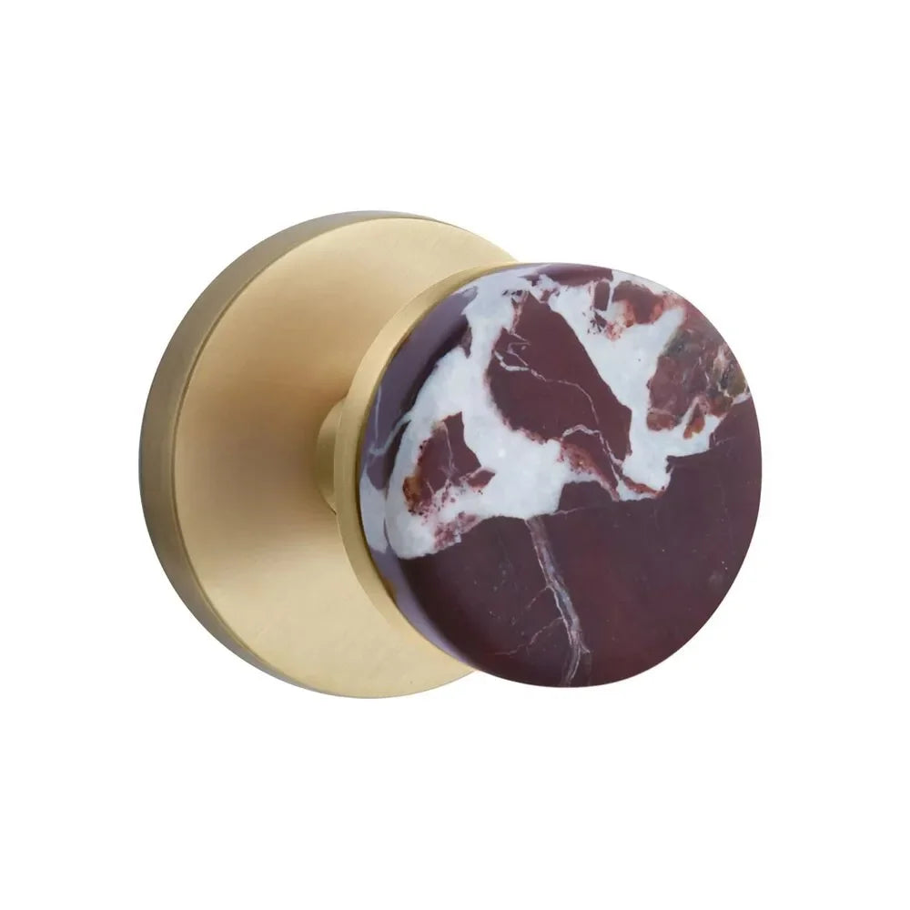 The Emtek Select Conical Rosso Levanto Marble Knobset with Disk Rosette in French Antique finish.