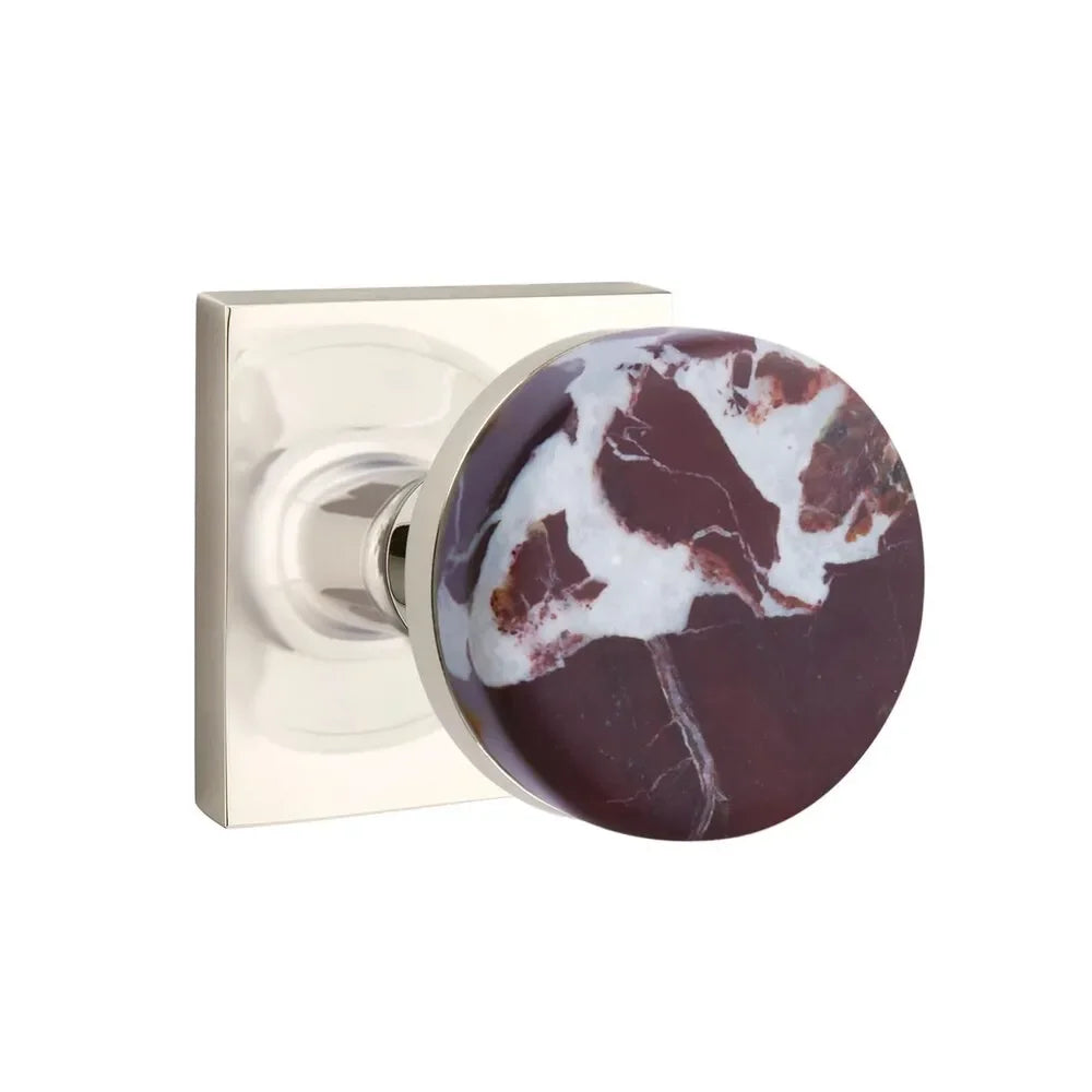 The Emtek Select Conical Rosso Levanto Marble Knobset with Square Rosette in Lifetime Polished Nickel finish.