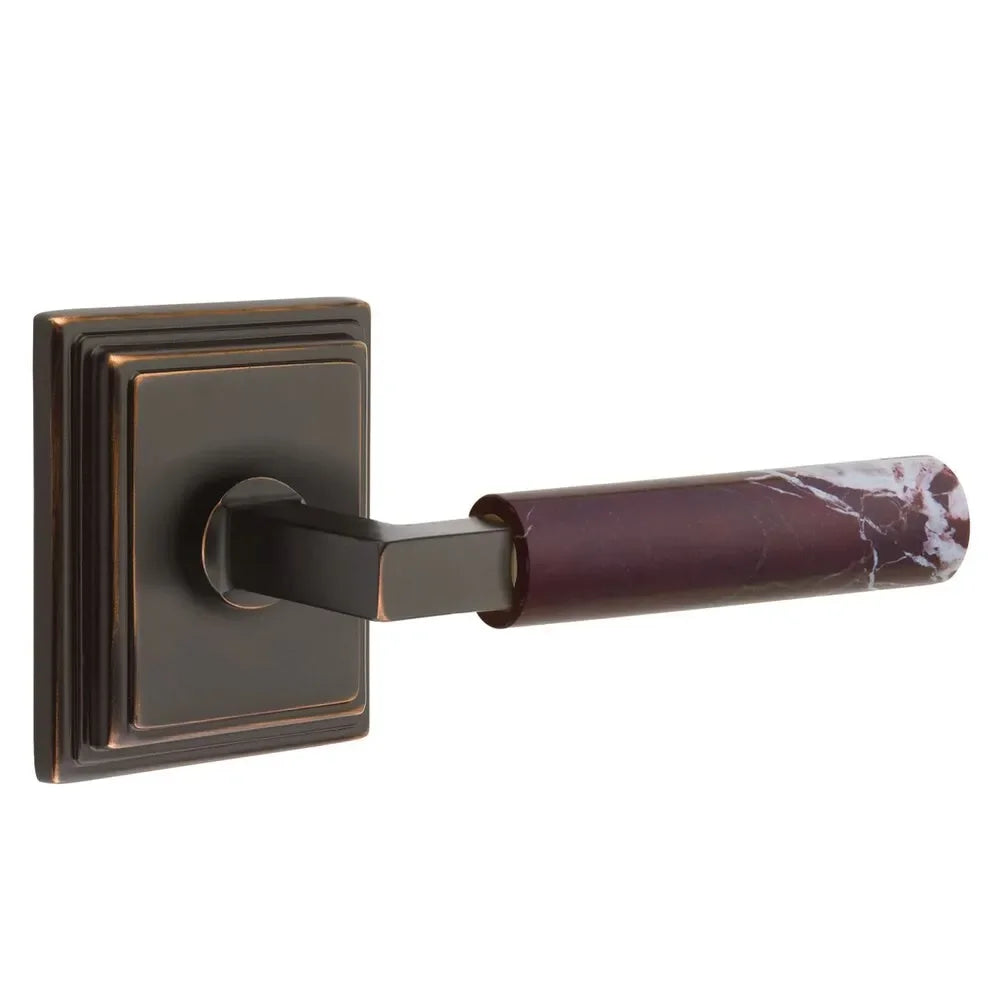 The Emtek Select L-Square Rosso Levanto Marble Lever with Wilshire Rosette in Oil Rubbed Bronze finish.