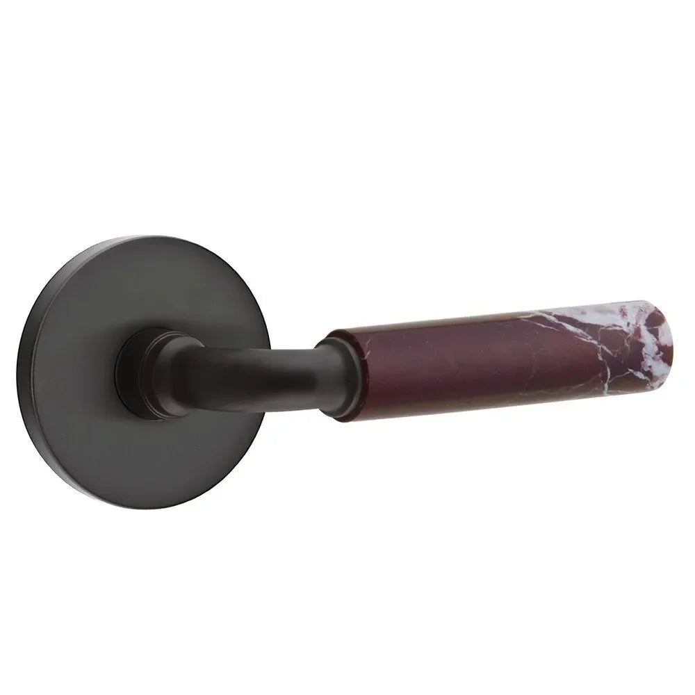 The Emtek Select R-Bar Rosso Levanto Marble Lever with Disk Rosette in Flat Black finish.