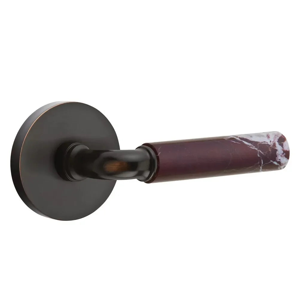 The Emtek Select R-Bar Rosso Levanto Marble Lever with Disk Rosette in Oil Rubbed Bronze finish.