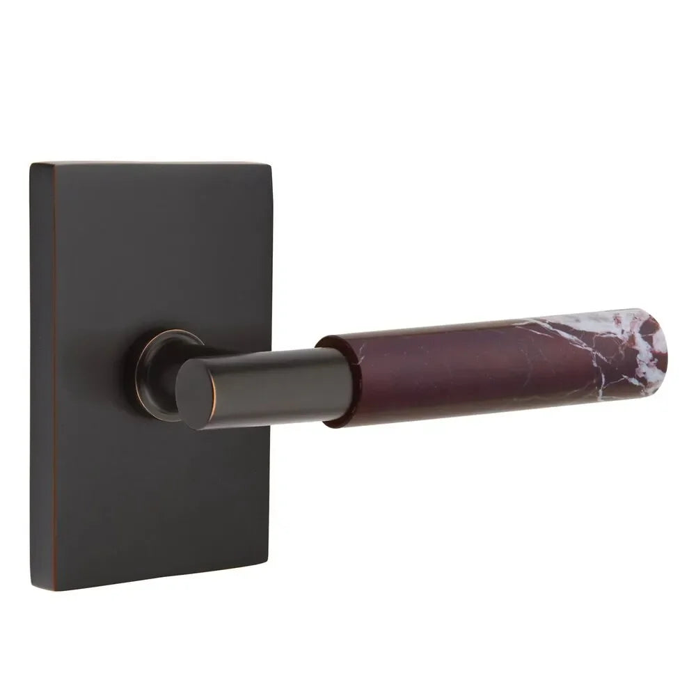 The Emtek Select T-Bar Rosso Levanto Marble Lever with Modern Rectangular Rosette in Oil Rubbed Bronze finish.