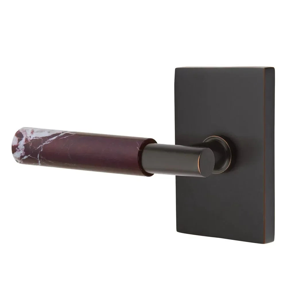 The Emtek Select T-Bar Rosso Levanto Marble Lever with Modern Rectangular Rosette in Oil Rubbed Bronze finish.