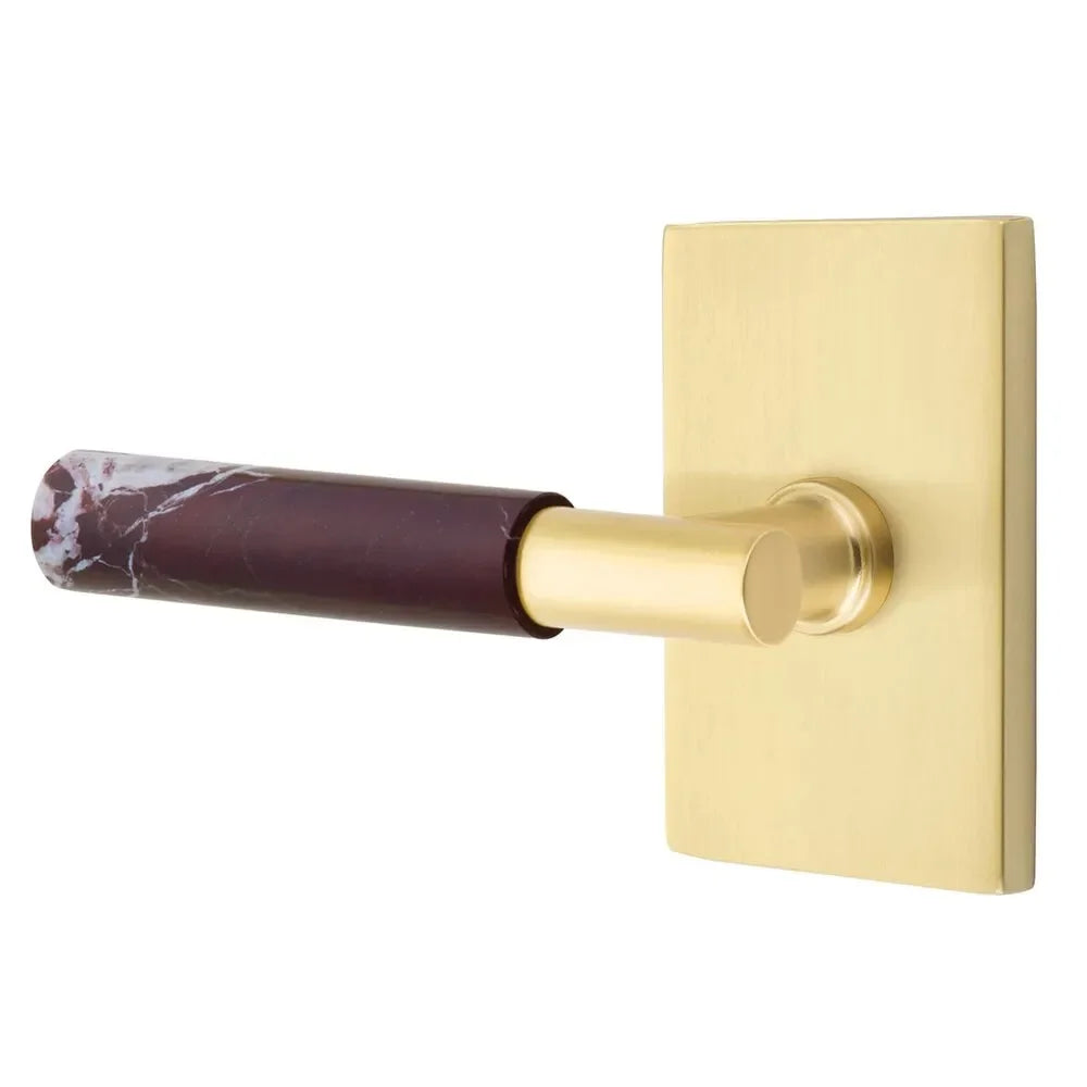 The Emtek Select T-Bar Rosso Levanto Marble Lever with Modern Rectangular Rosette in Satin Brass finish.