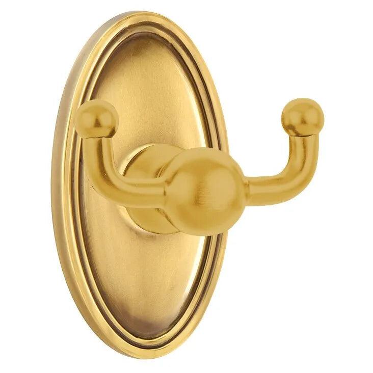 Emtek Traditional Brass Double Robe Hook With Oval Rosette in French Antique finish