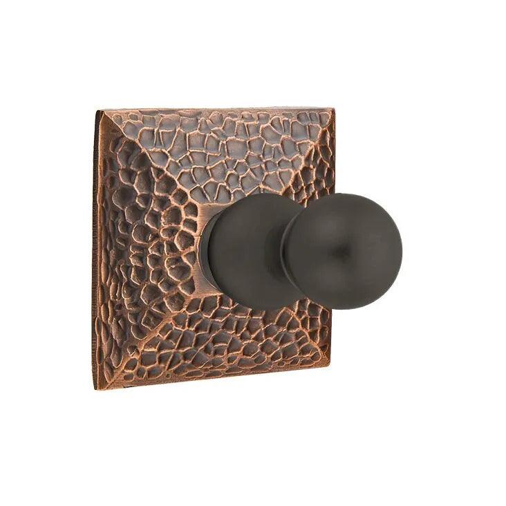 The Emtek Traditional Brass Single Robe Hook With Hammered Rosette in Oil Rubbed Bronze finish.