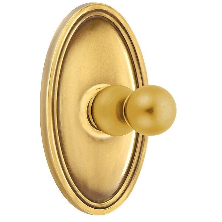 Emtek Traditional Brass Single Robe Hook With Oval Rosette in French Antique finish