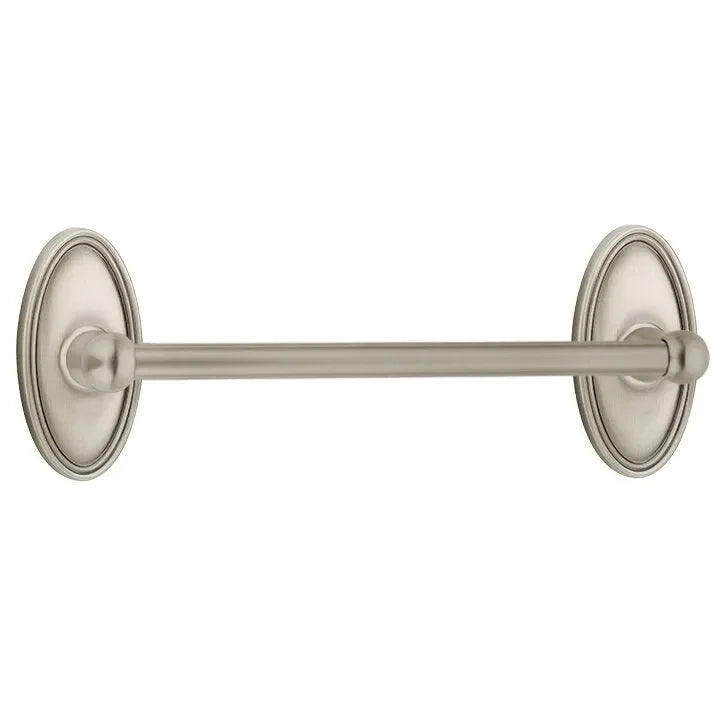 The Emtek Traditional Brass Towel Bar with Oval Rosette in Pewter finish.