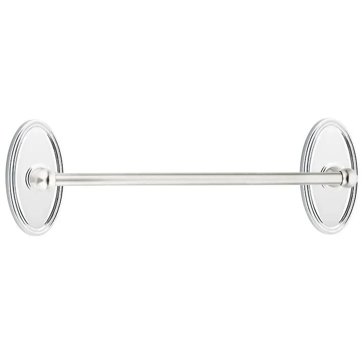 The Emtek Traditional Brass Towel Bar with Oval Rosette in Polished Chrome finish.