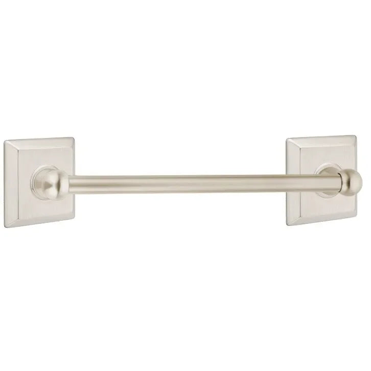 The Emtek Traditional Brass Towel Bar with Quincy Rosette in finish.