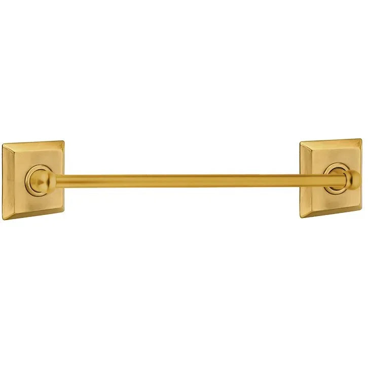 The Emtek Traditional Brass Towel Bar with Quincy Rosette in French Antique finish.