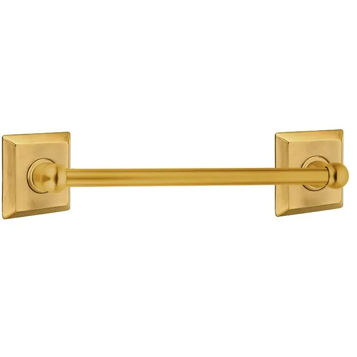 The Emtek Traditional Brass Towel Bar with Quincy Rosette in French Antique finish.